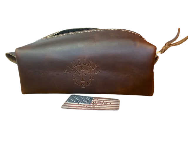 Dopp Bag: Leather Dopp Bag With Timeless Razor Logo: Oxford Brown